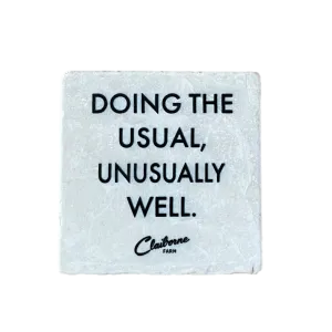 "Doing the Usual, Unusually Well" Motto Marble Coaster